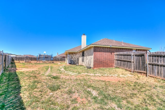 1605 Amberton Pkwy, San Angelo, TX 76901 - view of yard featuring a trampoline