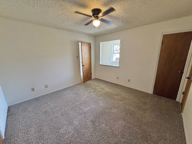 1036 Glenna Dr, San Angelo, TX 76901 - carpeted spare room featuring ceiling fan and a textured ceiling