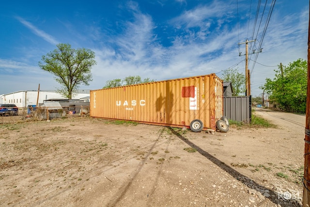 view of outdoor structure with fence
