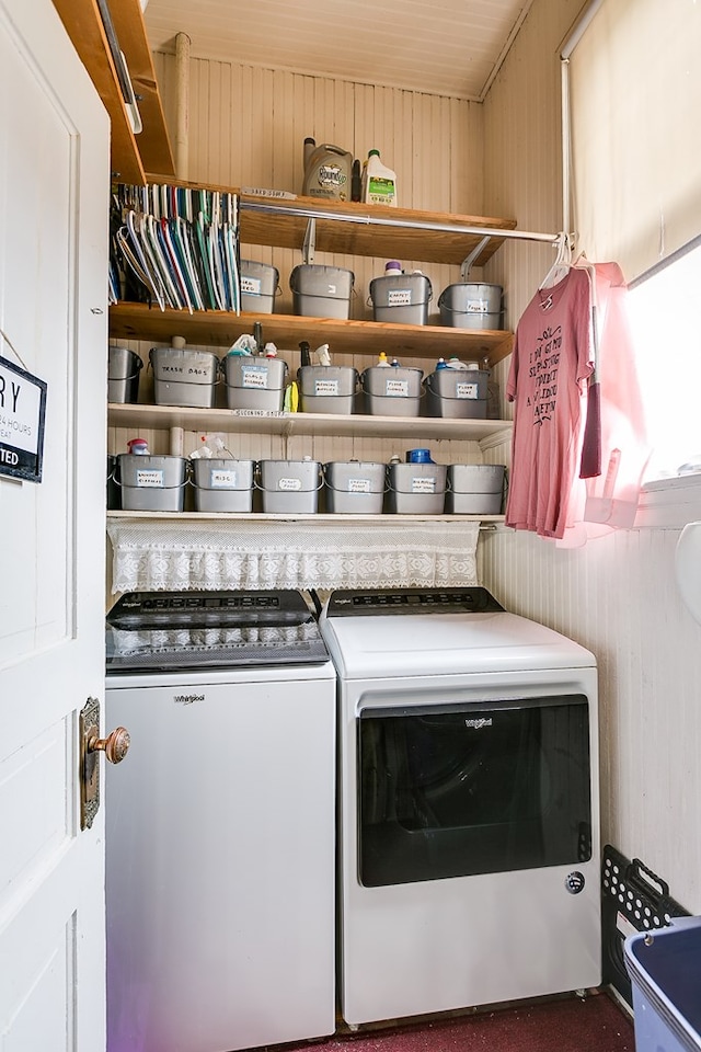 washroom featuring washing machine and dryer