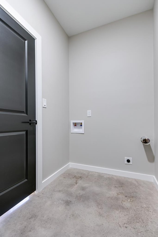 2122 Deaton St, San Angelo, TX 76903 - washroom featuring washer hookup, baseboards, and hookup for an electric dryer