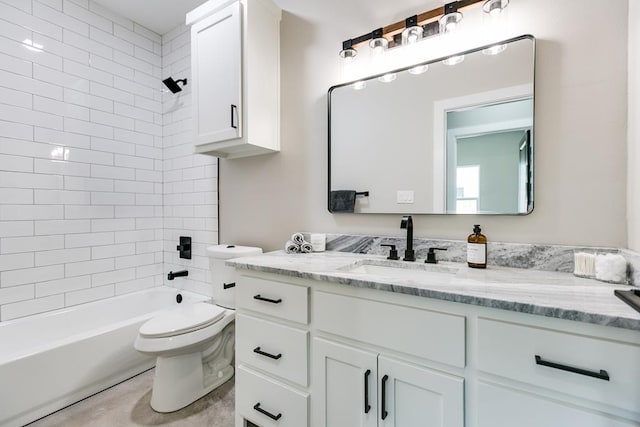 2122 Deaton St, San Angelo, TX 76903 - bathroom featuring vanity, toilet, and shower / tub combination