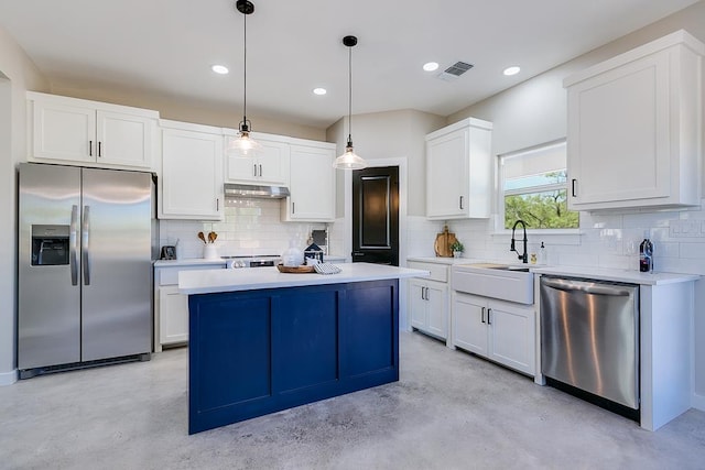 2122 Deaton St, San Angelo, TX 76903 - kitchen with appliances with stainless steel finishes, concrete flooring, a sink, white cabinetry, and under cabinet range hood