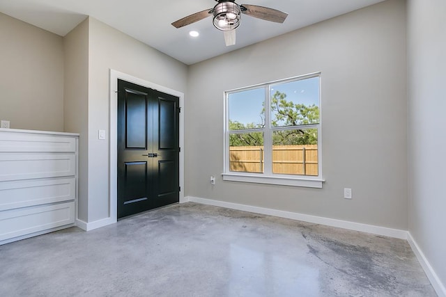 2122 Deaton St, San Angelo, TX 76903 - foyer entrance featuring concrete flooring, a ceiling fan, baseboards, and recessed lighting