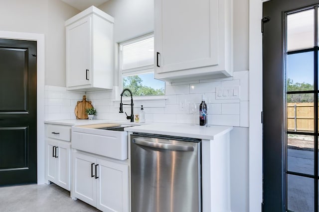 2122 Deaton St, San Angelo, TX 76903 - kitchen featuring dishwasher, tasteful backsplash, light countertops, and a sink