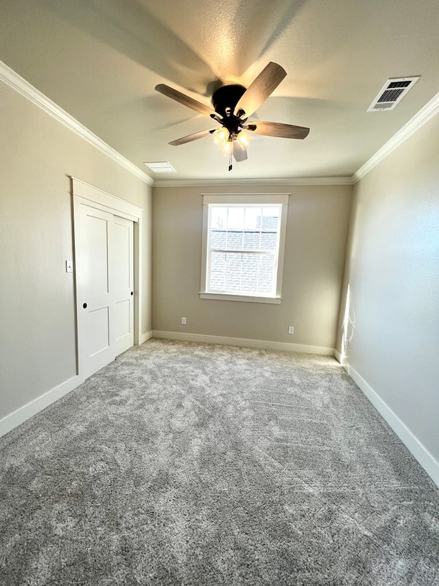 1962 Beaty Rd, San Angelo, TX 76904 - unfurnished bedroom with ornamental molding, carpet floors, baseboards, and a ceiling fan