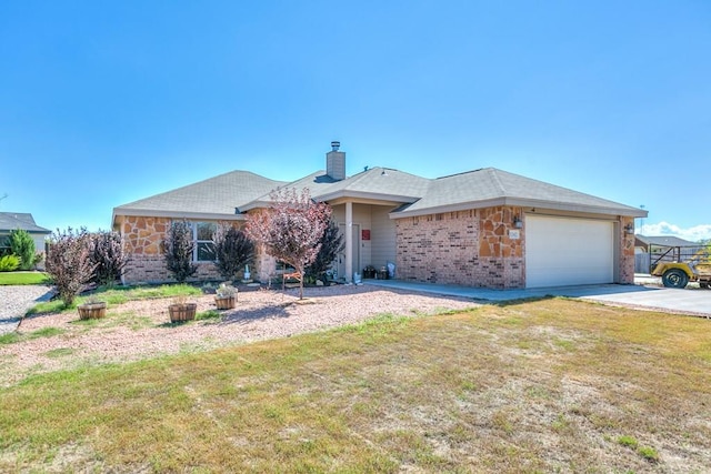 ranch-style house with a garage and a front lawn