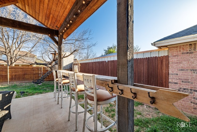 view of patio featuring a fenced backyard