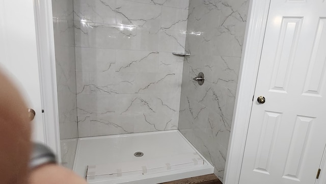 bathroom featuring walk in shower