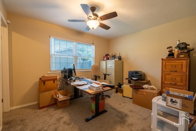 office space with carpet flooring and ceiling fan