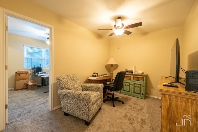 carpeted office with ceiling fan