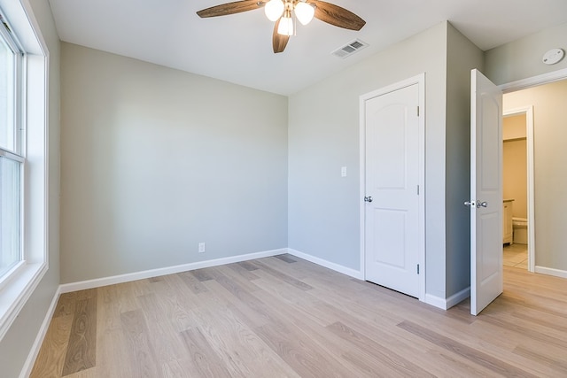 unfurnished bedroom featuring ceiling fan and light hardwood / wood-style flooring