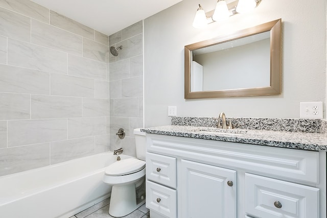 full bathroom with vanity, tiled shower / bath combo, and toilet