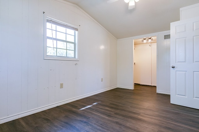 2113 S Hill St, San Angelo, TX 76903 - unfurnished bedroom featuring lofted ceiling, dark wood finished floors, baseboards, and ceiling fan