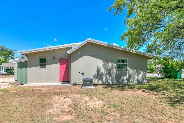 2113 S Hill St, San Angelo, TX 76903 - rear view of house with central AC unit