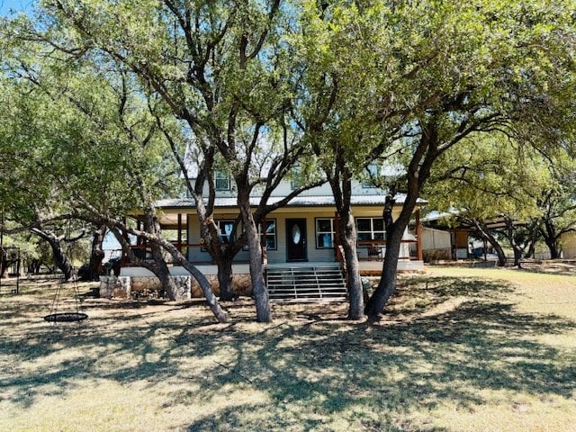 view of front of home featuring covered porch