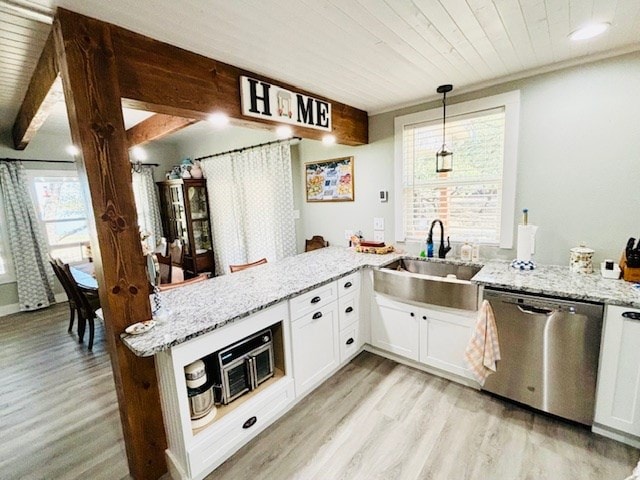 kitchen with a healthy amount of sunlight, light wood-type flooring, dishwasher, a sink, and wooden ceiling