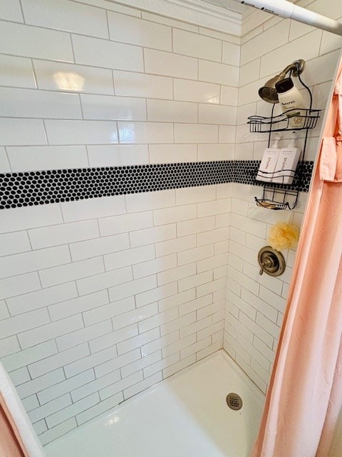 bathroom featuring a stall shower