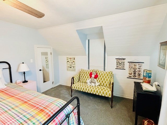 bedroom with carpet and lofted ceiling
