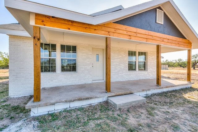 rear view of house with a patio area