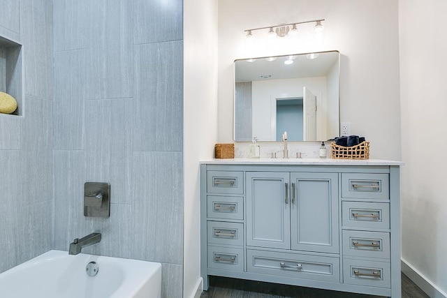 bathroom with shower / bath combination and vanity