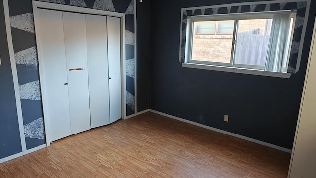 unfurnished bedroom with light hardwood / wood-style flooring