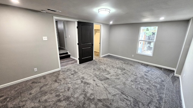 2514 S Hill St, San Angelo, TX 76903 - unfurnished bedroom featuring carpet, visible vents, and baseboards