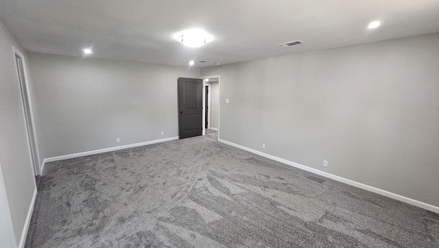2514 S Hill St, San Angelo, TX 76903 - carpeted empty room with baseboards, visible vents, and recessed lighting