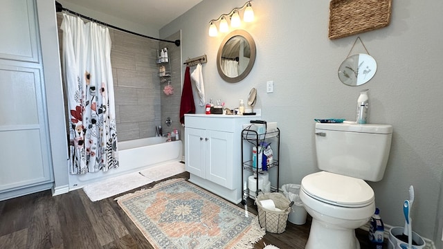 full bathroom with shower / bath combination with curtain, wood-type flooring, toilet, and vanity