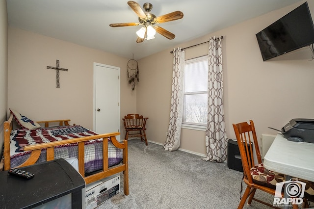 bedroom with baseboards, a ceiling fan, and carpet flooring