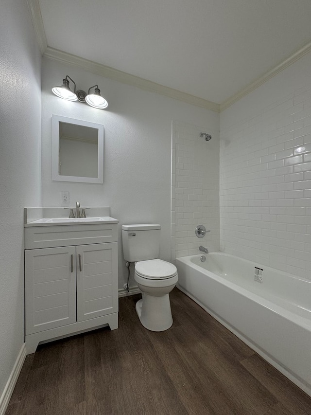 full bathroom featuring crown molding, wood-type flooring, toilet, and vanity