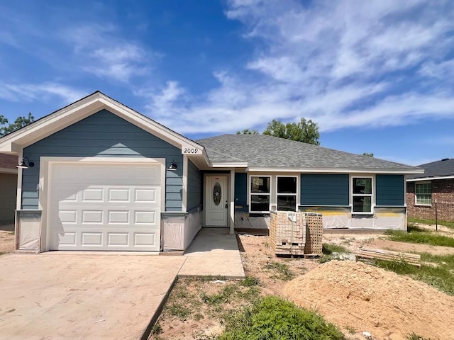 2009 Hudson St, San Angelo, TX 76903 - ranch-style house with a garage and driveway