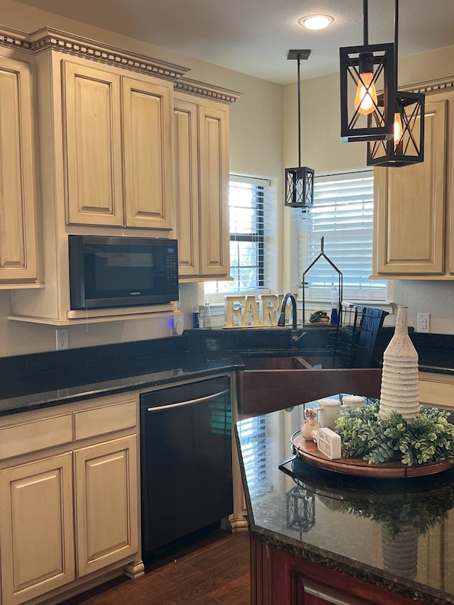 kitchen with dark hardwood / wood-style floors, dark stone counters, decorative light fixtures, and black appliances