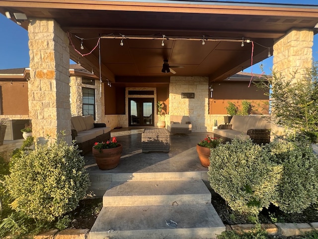 view of patio with outdoor lounge area, ceiling fan, and french doors