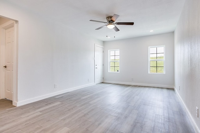 2624 Dallas St, San Angelo, TX 76903 - unfurnished room featuring light wood-style flooring, ceiling fan, baseboards, and recessed lighting