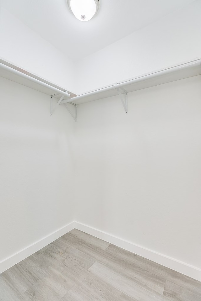 2624 Dallas St, San Angelo, TX 76903 - spacious closet featuring light wood finished floors