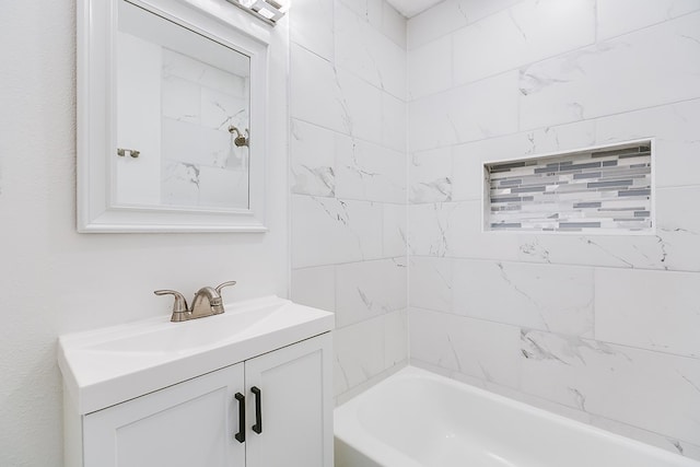 2624 Dallas St, San Angelo, TX 76903 - bathroom featuring vanity and washtub / shower combination