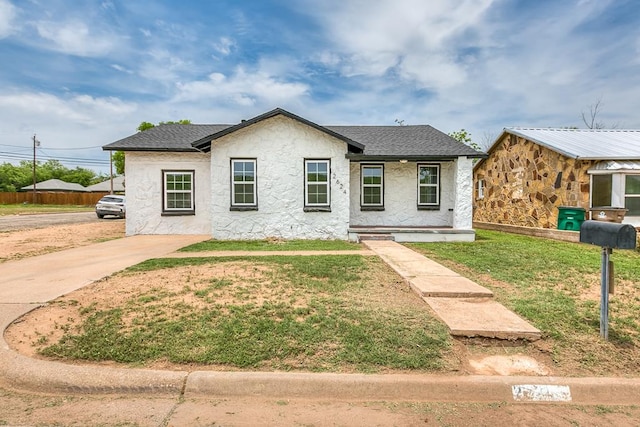 2624 Dallas St, San Angelo, TX 76903 - view of front of home featuring a front lawn and a shingled roof