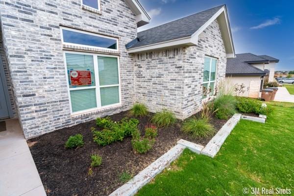 view of property exterior featuring a lawn