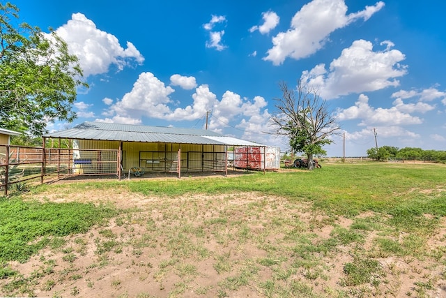 2709 Janie Ln, San Angelo, TX 76905 - view of yard with an exterior structure and an outbuilding