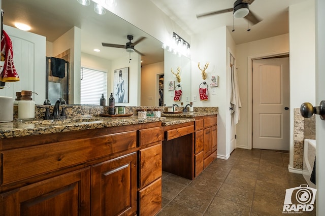 bathroom featuring vanity, a shower, and ceiling fan