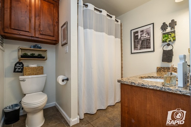 bathroom featuring vanity, tile patterned floors, toilet, and a shower with shower curtain