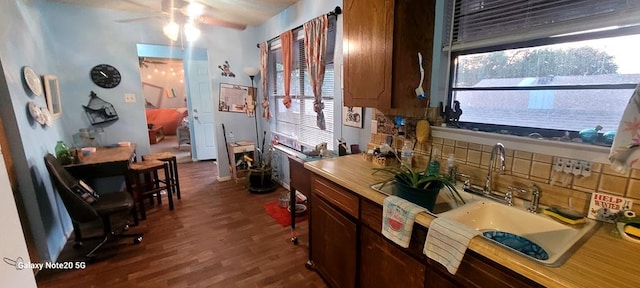 kitchen with hardwood / wood-style flooring, sink, and ceiling fan