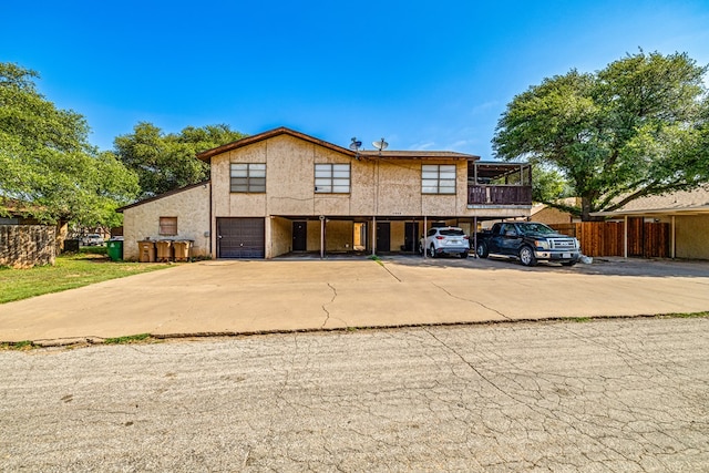 front of property with a garage