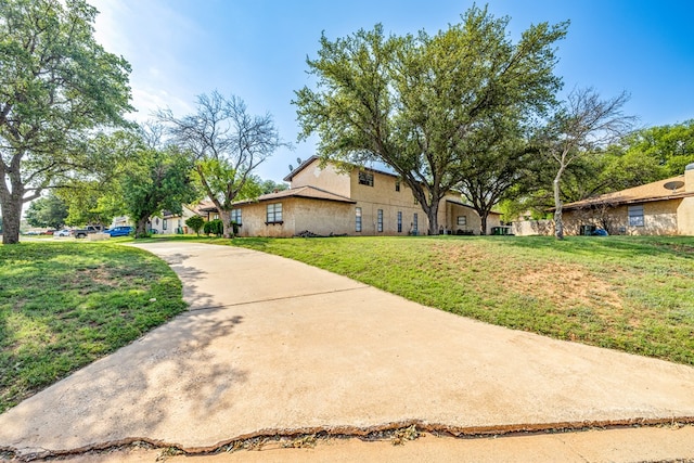 view of front of house with a front lawn