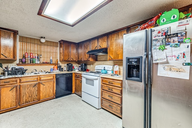 kitchen featuring dishwasher, sink, stainless steel fridge, white electric range oven, and a textured ceiling