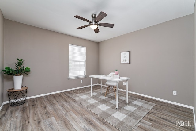 office with wood finished floors, baseboards, and ceiling fan