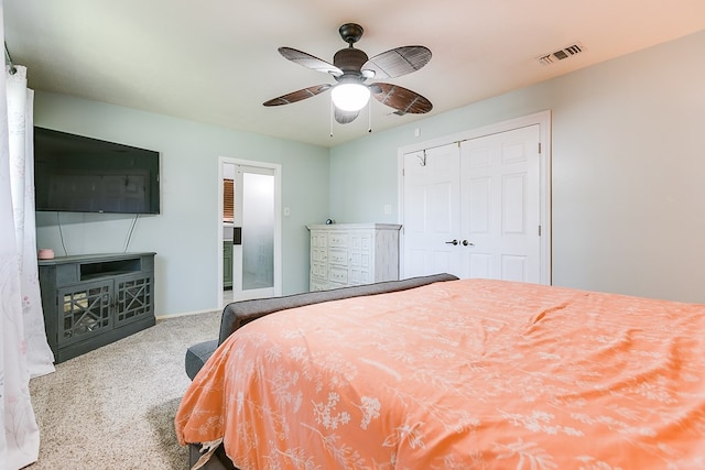 bedroom featuring ceiling fan and a closet