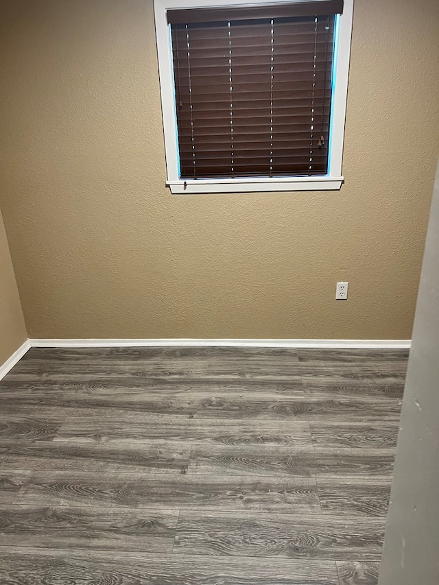 empty room featuring hardwood / wood-style floors