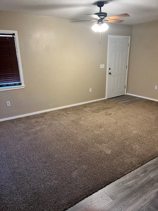 unfurnished room with ceiling fan